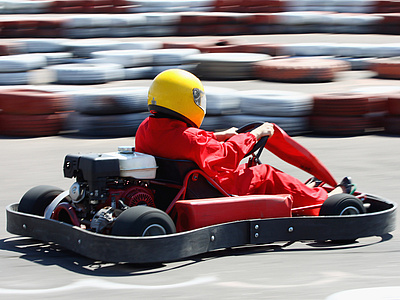 Action, Adventure, Blurred Motion, Cart, Circuit Board, Color Image, Competition, Competitive Sport, Concentration, Drive, Driving, Engine, Exhilaration, Focus, Go-Carting, Go-cart, Horizontal, Leadership, Leisure Activity, Occupation, One Person, Passion, Speed, Sport, Sports Race, Sports Track, Struggle, Winning